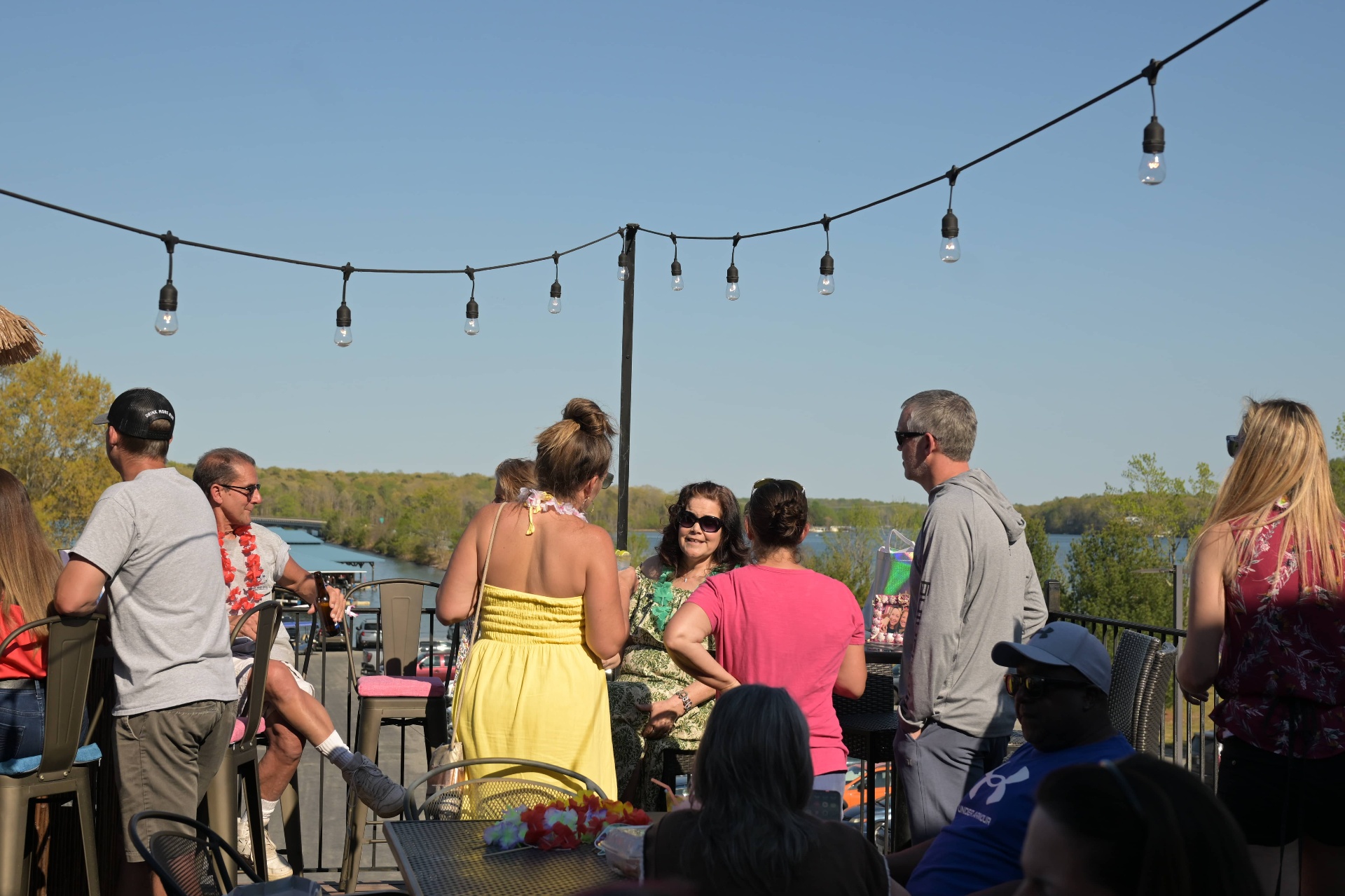 Lakeside crowd enjoying the breeze